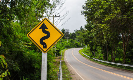 winding road sign