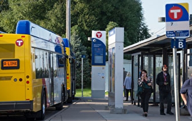 Metro Transit bus pulled into a bus stop