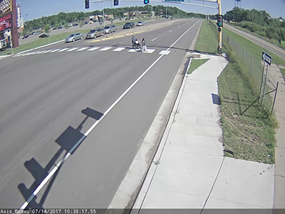 Pedestrians in a crosswalk at a signalized intersection