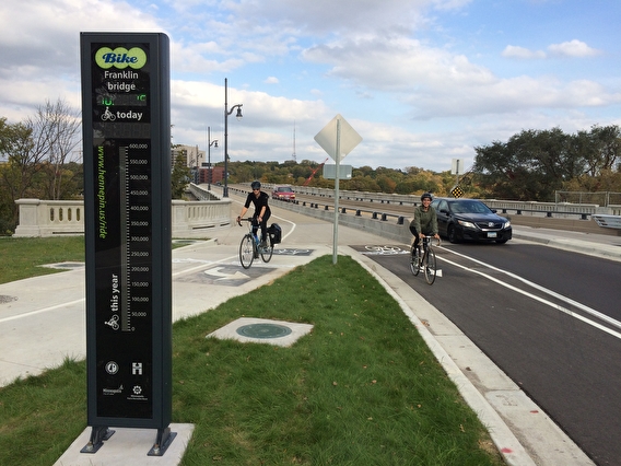 Bicylicsts riding in dedicated bike lanes on the Franklin bridge