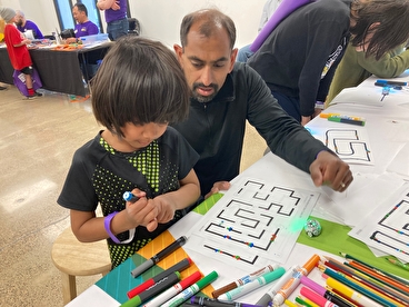 Kids experimenting with Ozobots at Tech Fest