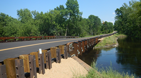 Timber bridge over a river